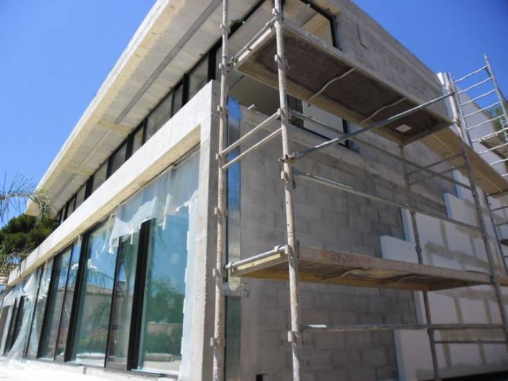 Isolation Thermique par l'Extérieur (ITE) finition stuc enduit chaux Marmorino d'une villa contemporaine à Sanary-sur-Mer (83110) - Architecte M. Rudy Ricciotti
