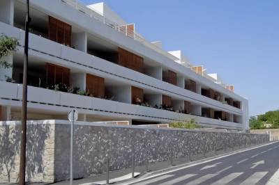 Application de peinture minérale silicatée Keim sur les façades de la résidence Les Terrasses de Montredon à Marseille (13008)